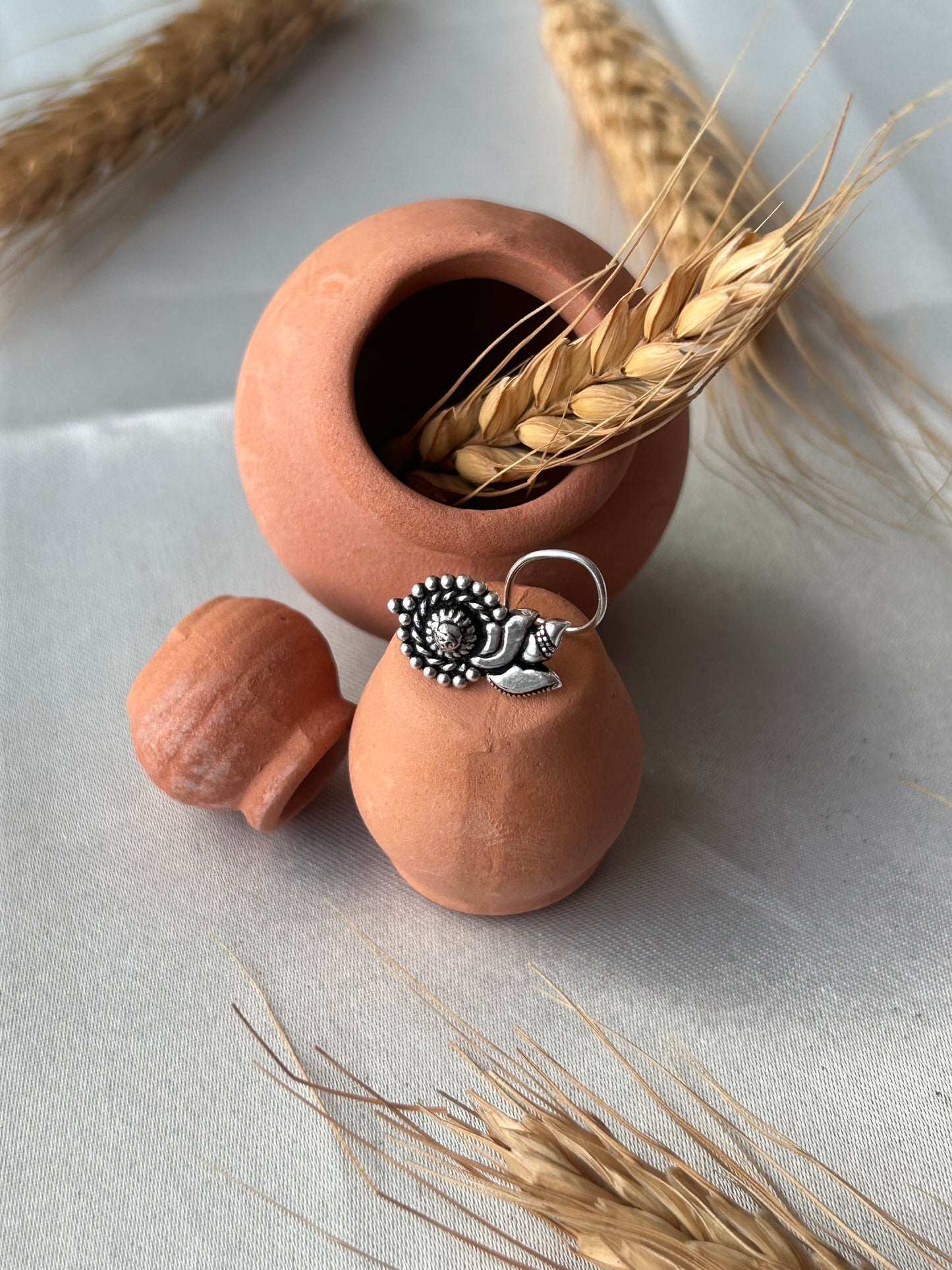 Amudha • அமுதா • 925 Silver Corkscrew Nose Stud
