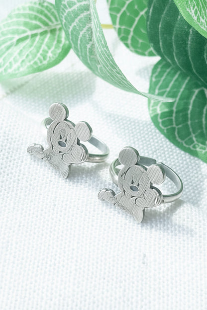  925 silver mouse silhouette toe ring pair displayed on white linen fabric